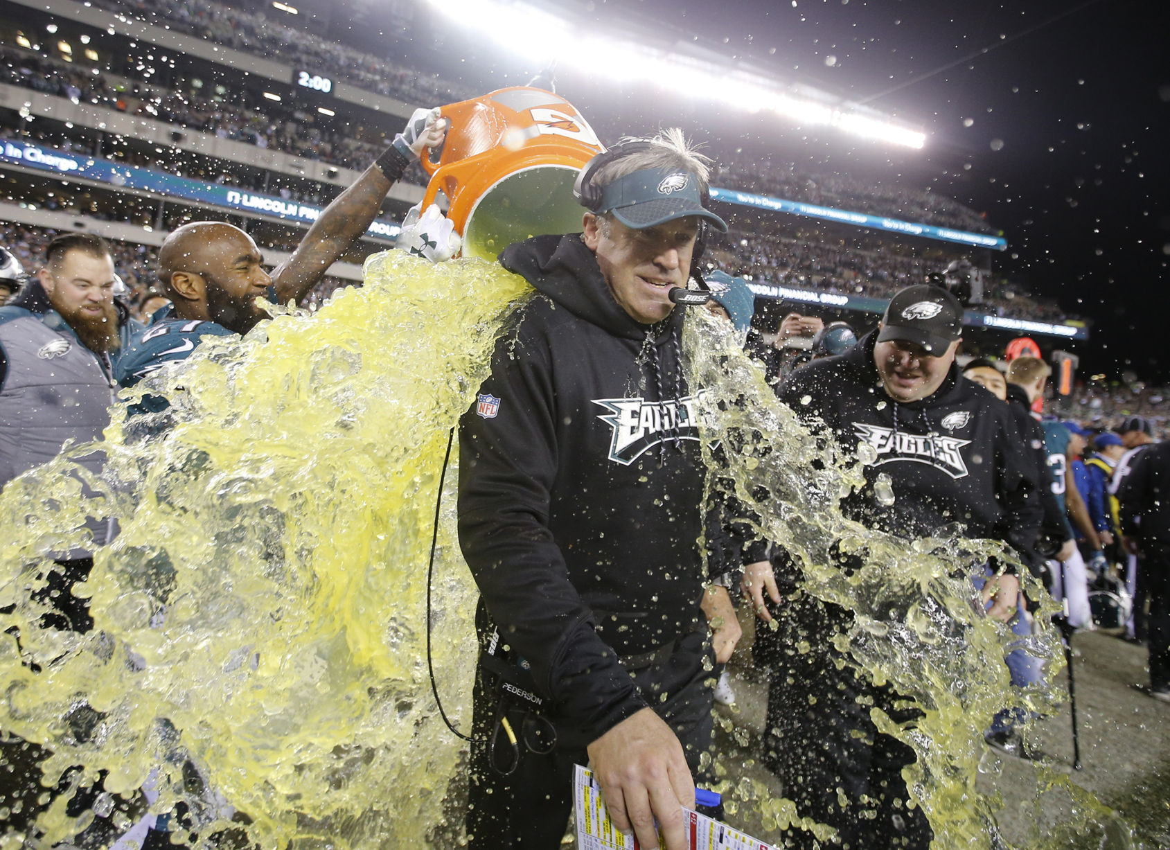 What color will the liquid be that is poured on the game-winning coach?